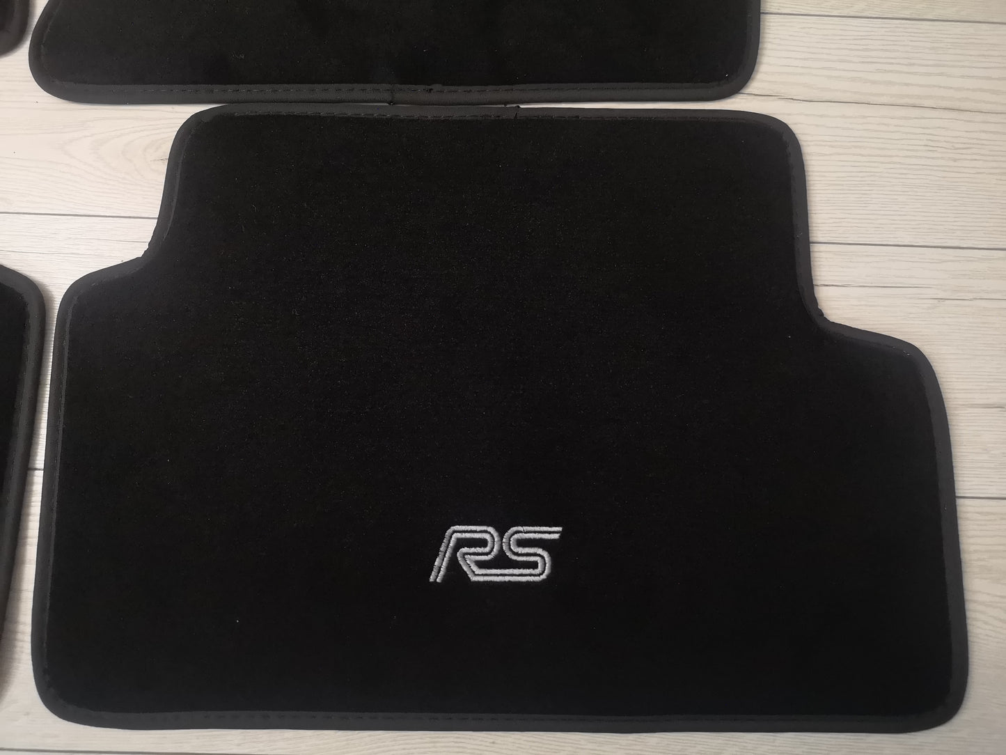 Ford focus RS MK1 1998-2005 premium black velour floor mats with white RS logo and black edge